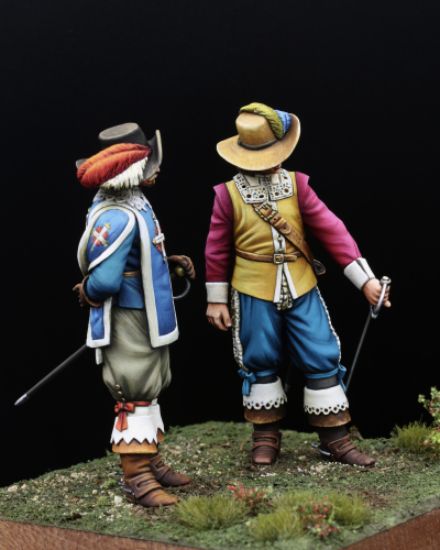Right side: The new blade, Musketeers of the Guard, 1622 a pair of 75mm figure fine scale model kit produced by Hawk Miniatures