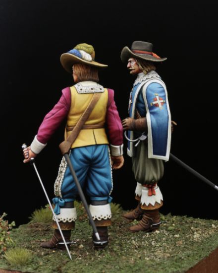 Left side: The new blade, Musketeers of the Guard, 1622 a pair of 75mm figure fine scale model kit produced by Hawk Miniatures